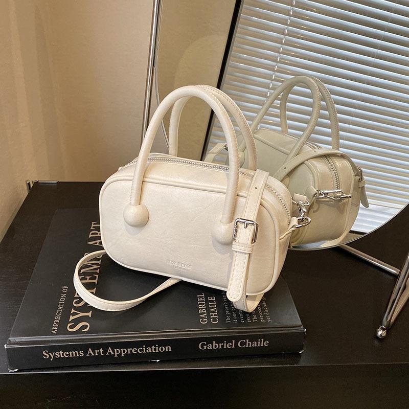 

Ручная сумка-боулинг 2025 новая мода простая наплечная сумка высококлассная нишевая женская сумка