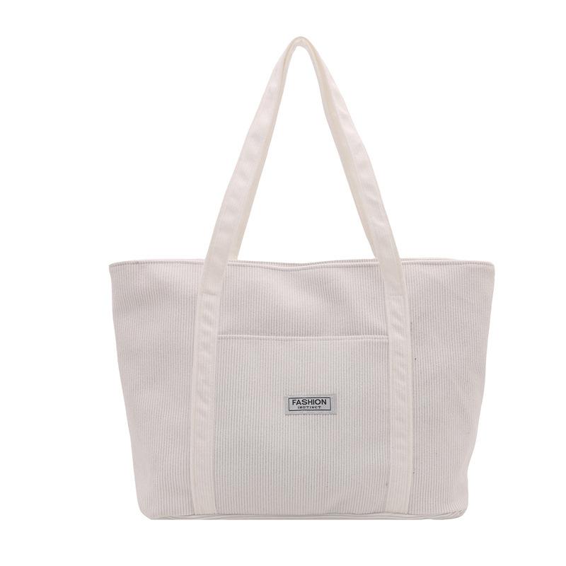 Casual simple portable tote bag women's autumn new largecapacity shoulder bag commuter casual armpit bag