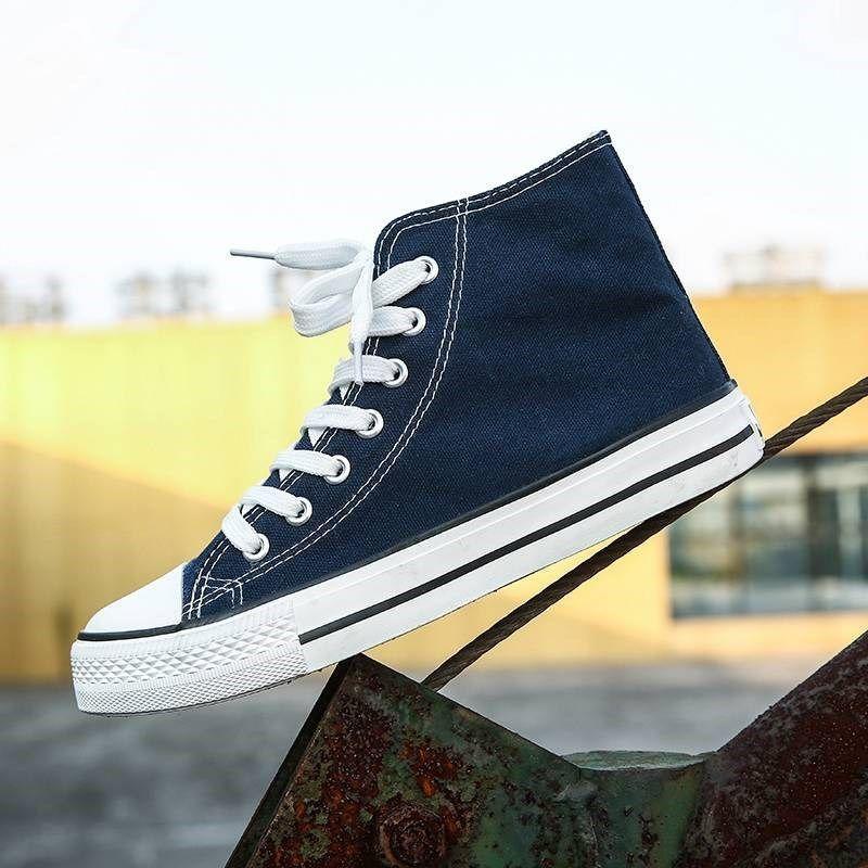 

Високі парусинові кеди чоловічі корейська версія тренд 1 весна та осінь нові Хараджуку ульззанг ретро універсальні студентські кеди 42 male темно-синього кольору