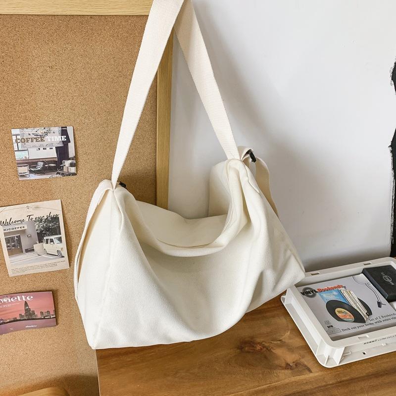 Canvas bag Large capacity messenger bag Female student school bag Handheld shoulder canvas bag