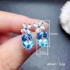 Cao Shi Micro-Paved Aquamarine Zircon Flower Stud Earrings with White Gold Plated Copper