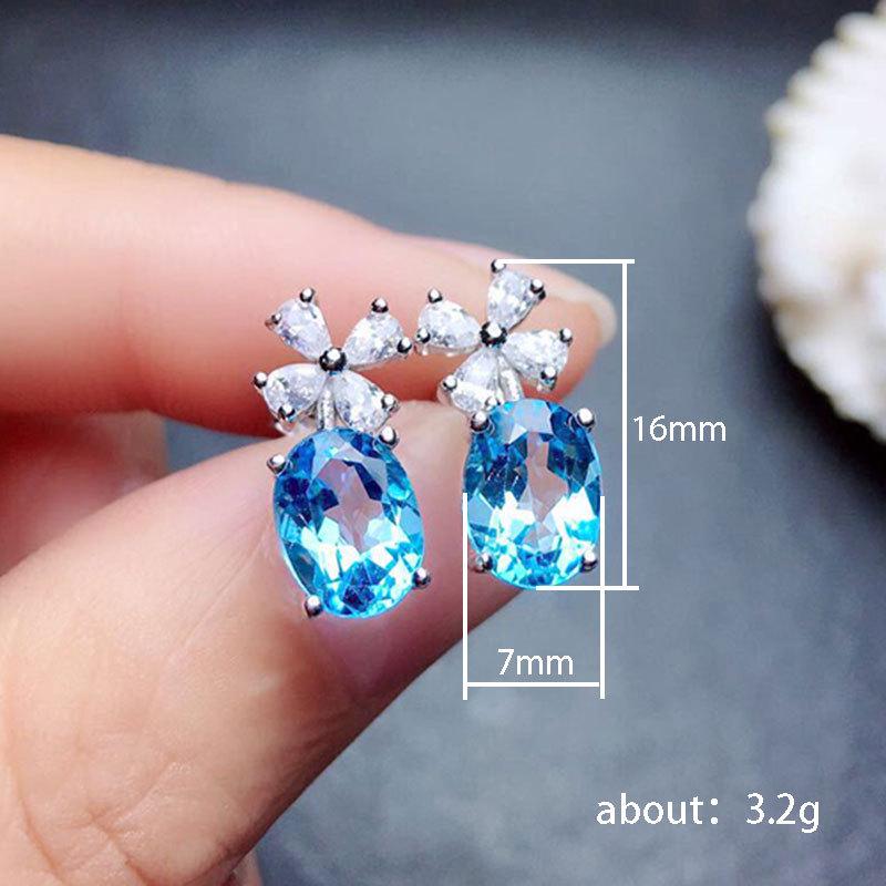 Cao Shi Micro-Paved Aquamarine Zircon Flower Stud Earrings with White Gold Plated Copper
