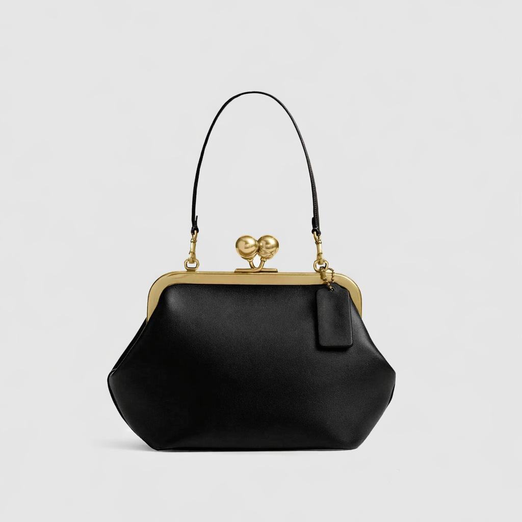 Vintage small kiss lock clip clutch
