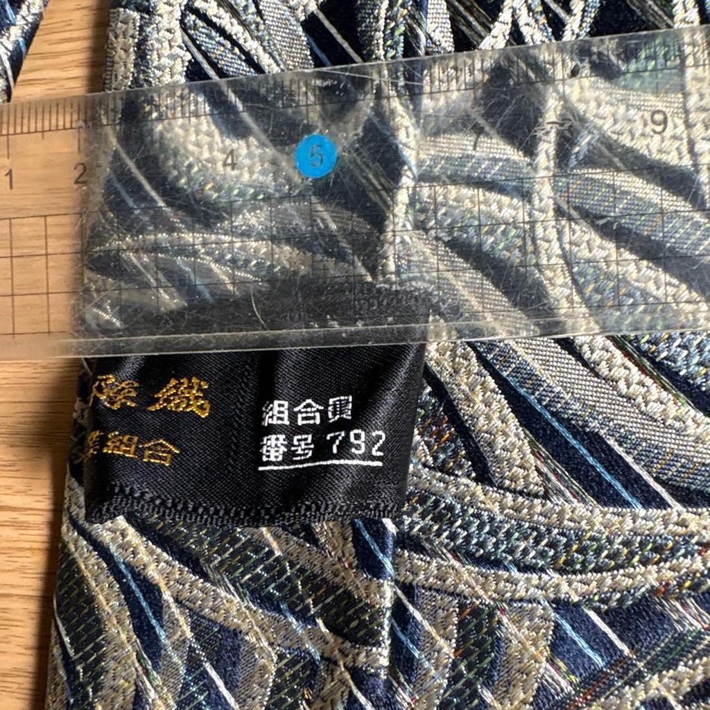 Used Nishijin-ori silk tie, blue and gold wave pattern