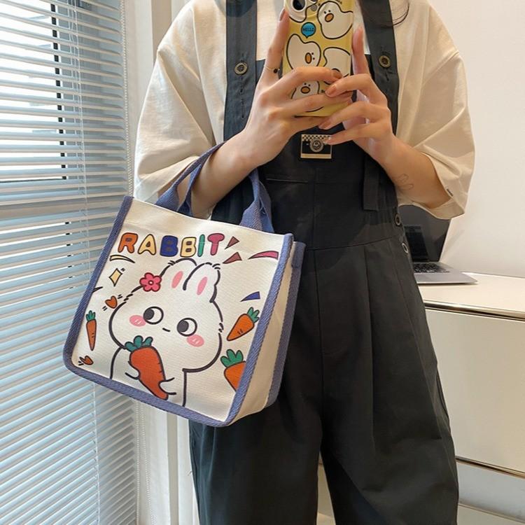 Japanese cute canvas bag bunny printed cartoon less tutoring bag go out hand carry bento bag wholesale