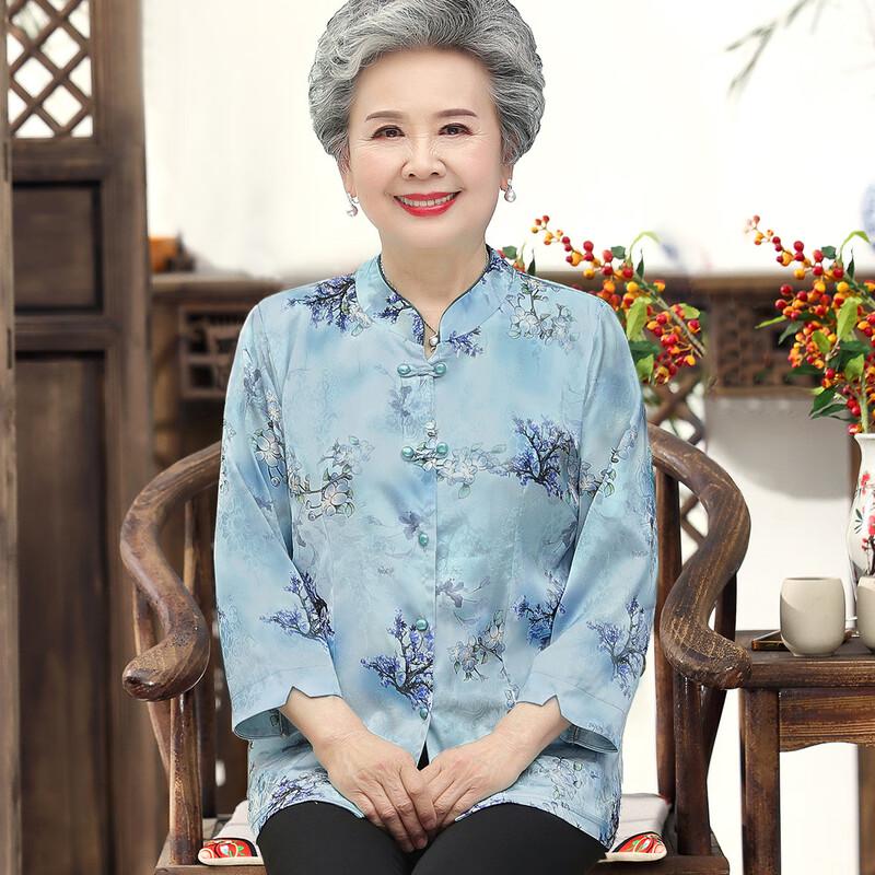 

Жіноча тонка вишита сорочка зі стійкою XL