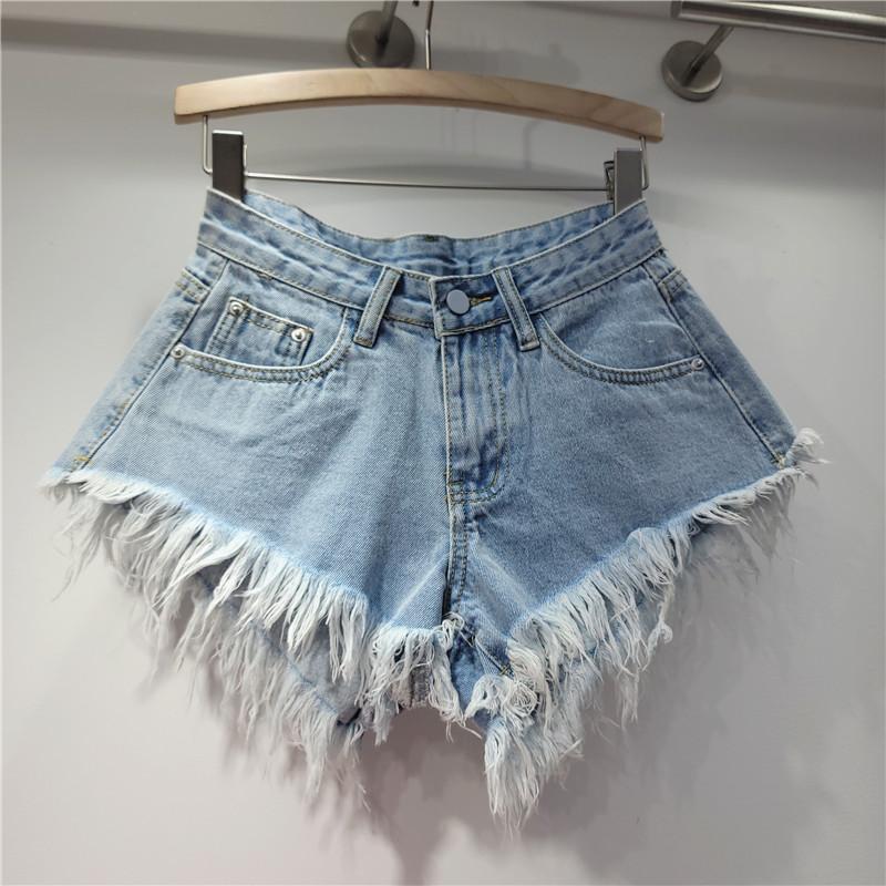 Korean version 2023 summer new fringed rough edge high waist denim shorts women's loose and thin a-shaped wide leg pants hot pants