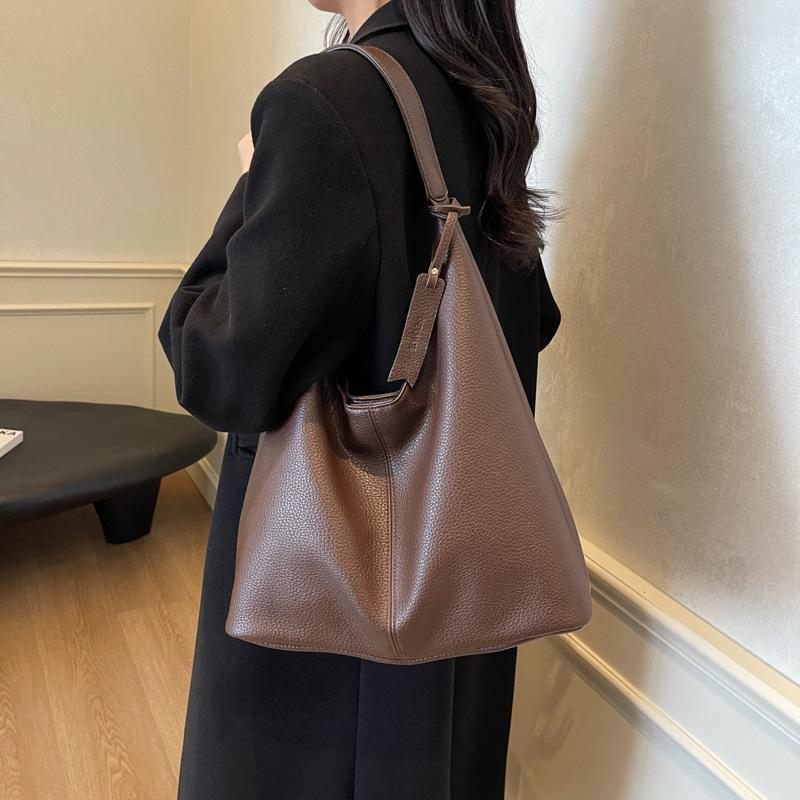 Autumn and winter retro commuter bag women's 2025 new shoulder underarm bag casual large capacity student class tote bag
