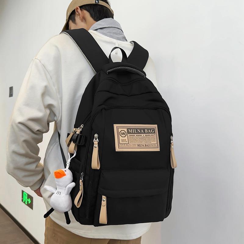 Schoolbag Korean version casual backpack large capacity student schoolbag junior high school student fashion new commuter backpack men
