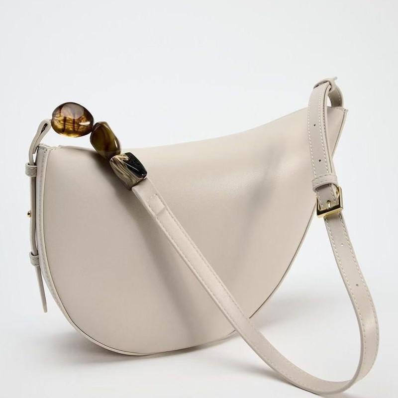 

2025 Fashion Classics Design Women Irregular Underarm Bag Casual PU Leather Handbags Asymmetric Shoulder Bag with Stone Chain бежевый