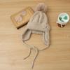 Hat women's autumn and winter cute hairball knitted wool hat thickened ear protection warm fashionable versatile