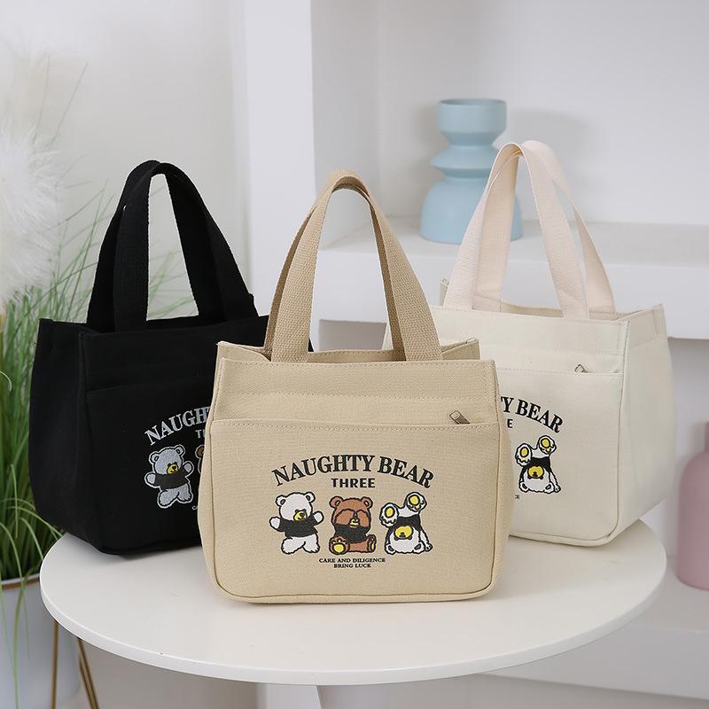 Cartoon cute canvas bag, women's bag, Bao Ma going out simple hand bag, bento office worker handbag