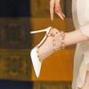 High heels women's 2025 spring new French one-word buckle rivet shoes pure desire Internet celebrity large size sandals pointed single shoes