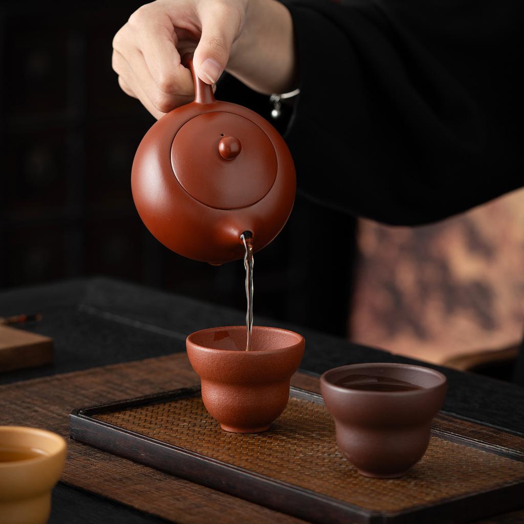 Chinese-style purple clay pot, one pot of four cups of kung fu tea set, high-end gifts for elders to lead customers' business activities