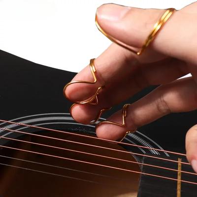 4 adet/takım Metal Gitar Seçtikleri 3 adet Parmak Seçtikleri + 1 adet Başparmak Seçim Parmak Ucu Elastik Gitar Aksesuarları Parmak Ucu Koruyucu