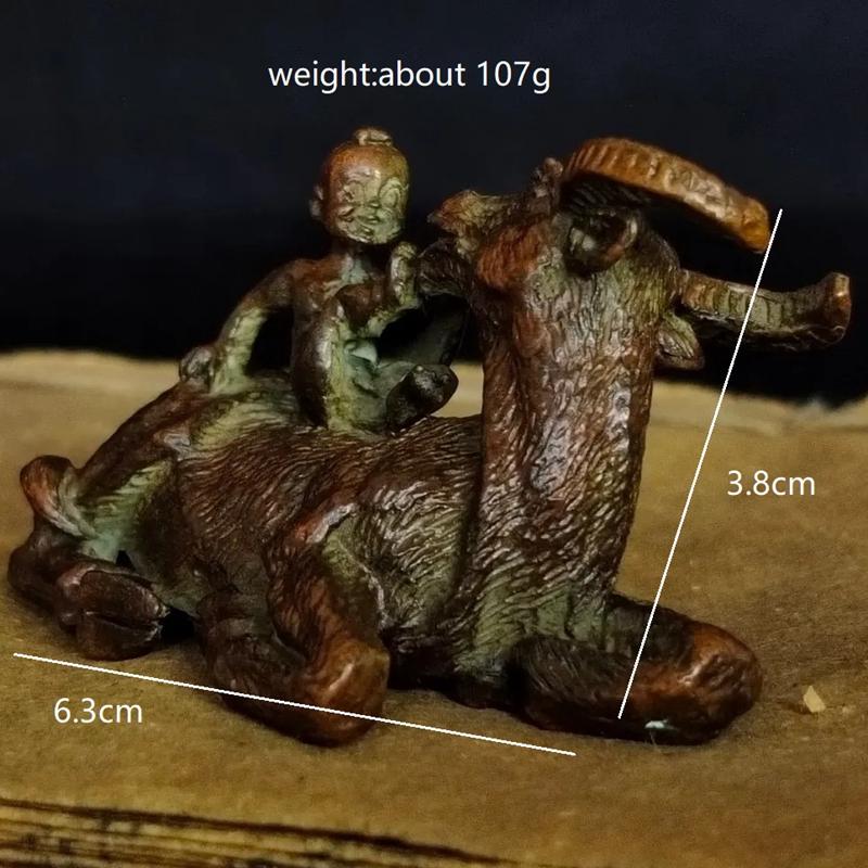 

Античная медь Маленькие дети, катающиеся на быке Маленькая статуэтка Счастливые украшения для дома Поделки Винтажные фигурки животных Настольные украшения