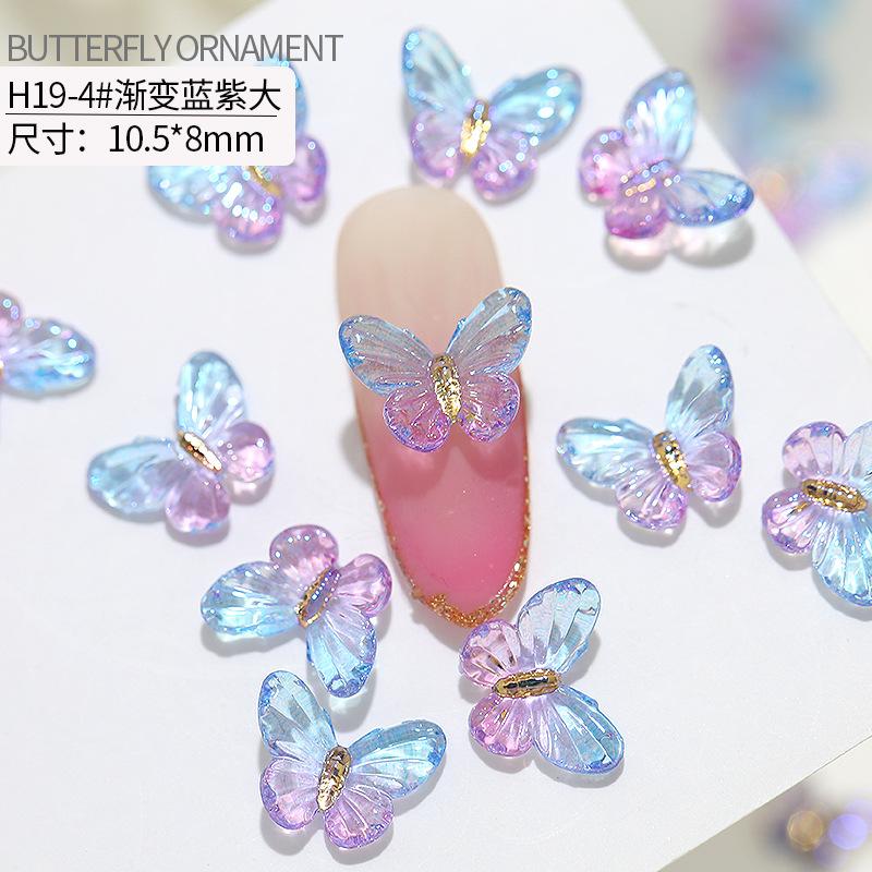 20 stuks vlinder nagelkunst accessoires - nageldecoraties met iriserende en driedimensionale vlinders gemaakt van hars voor nagelkunst.