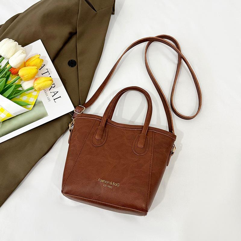 Premium Sense Versatile Portable Bucket Bag New Trendy Texture Casual Shoulder Messenger Bag Niche Design Women's Bag