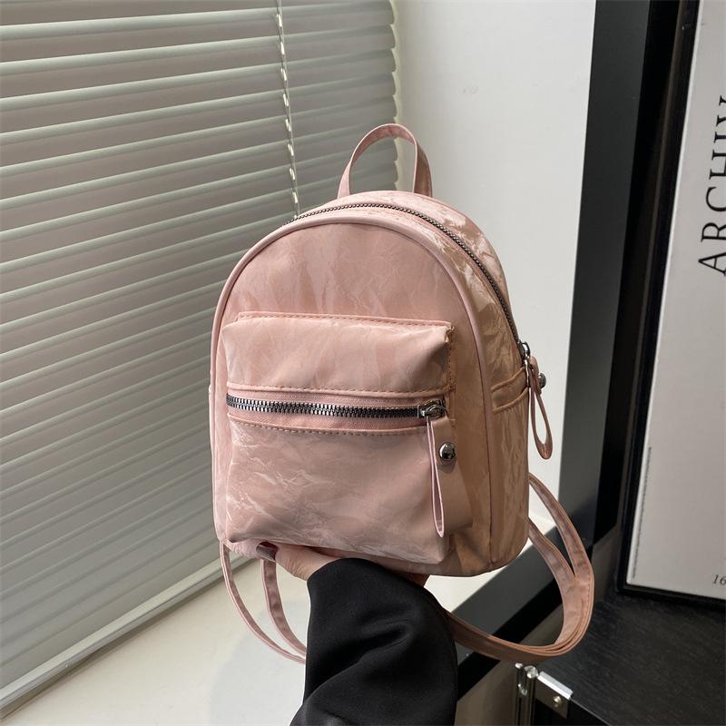 

Студенческий классный рюкзак для колледжа женский 2025 новый мини маленький рюкзак универсальный для поездок на работу и путешествий розовый