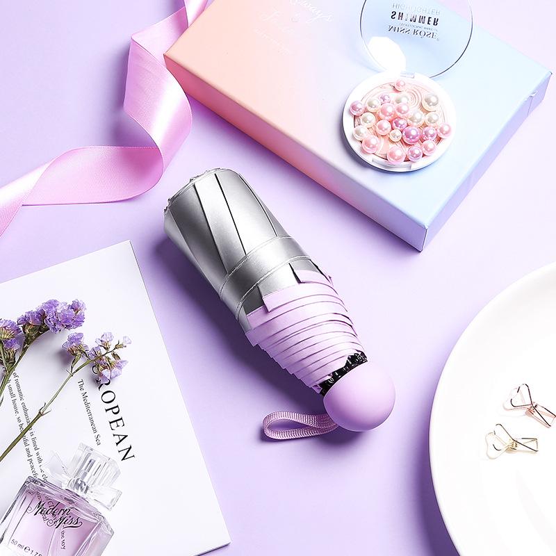 Titanium silver glue 50% off sun umbrella women's sunscreen parasol small fresh weather and rain folding umbrella umbrella
