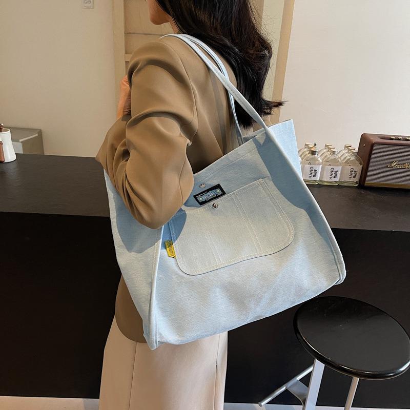 Simple and large-capacity denim tote bag women's new versatile commuter shoulder bag portable fashion shopping bag tide