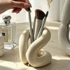 Knot Ceramic Makeup Brush Holder Modern Abstract S-Shape Cosmetic Organizer Decorative Vanity Cup for Brushes Lipsticks & Beauty Tools