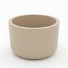 A Round Beige Flowerpot In a Minimalist Style