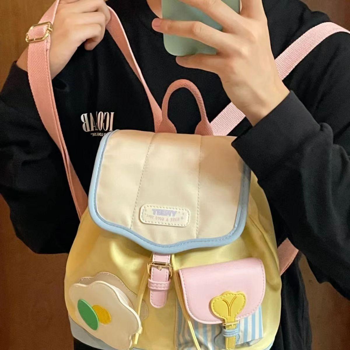

Мини-рюкзак Новая корейская версия сочетания цветов Школьный рюкзак для мальчиков и девочек Модный повседневный рюкзак Тренд 22x19x10cm светло-желтого