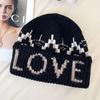 Fair Island style letter jacquard hat women's autumn and winter new warm knitted hat big head circumference wool hat headgear