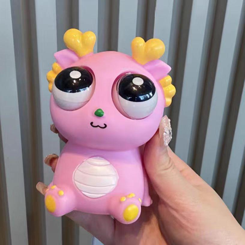 

Игрушка-антистресс в виде глаза дракона