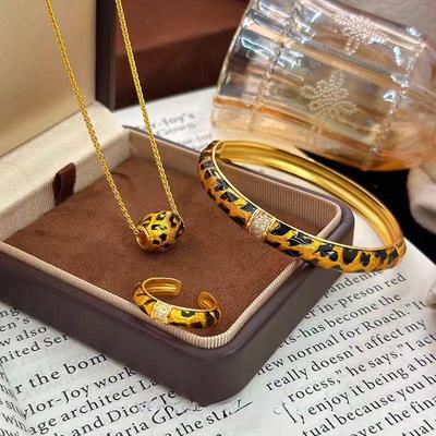 Gold-Plated Leopard Print Jewelry Set: Diamond-Studded Bracelet, Ring, and Necklace for Women.