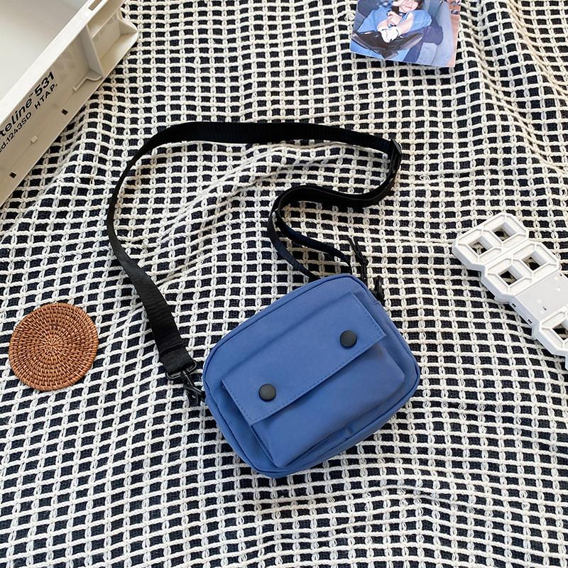 

Versatile Square Small Crossbody Bag For Men In White Black Khaki Green And Blue With Unique Stitching синій