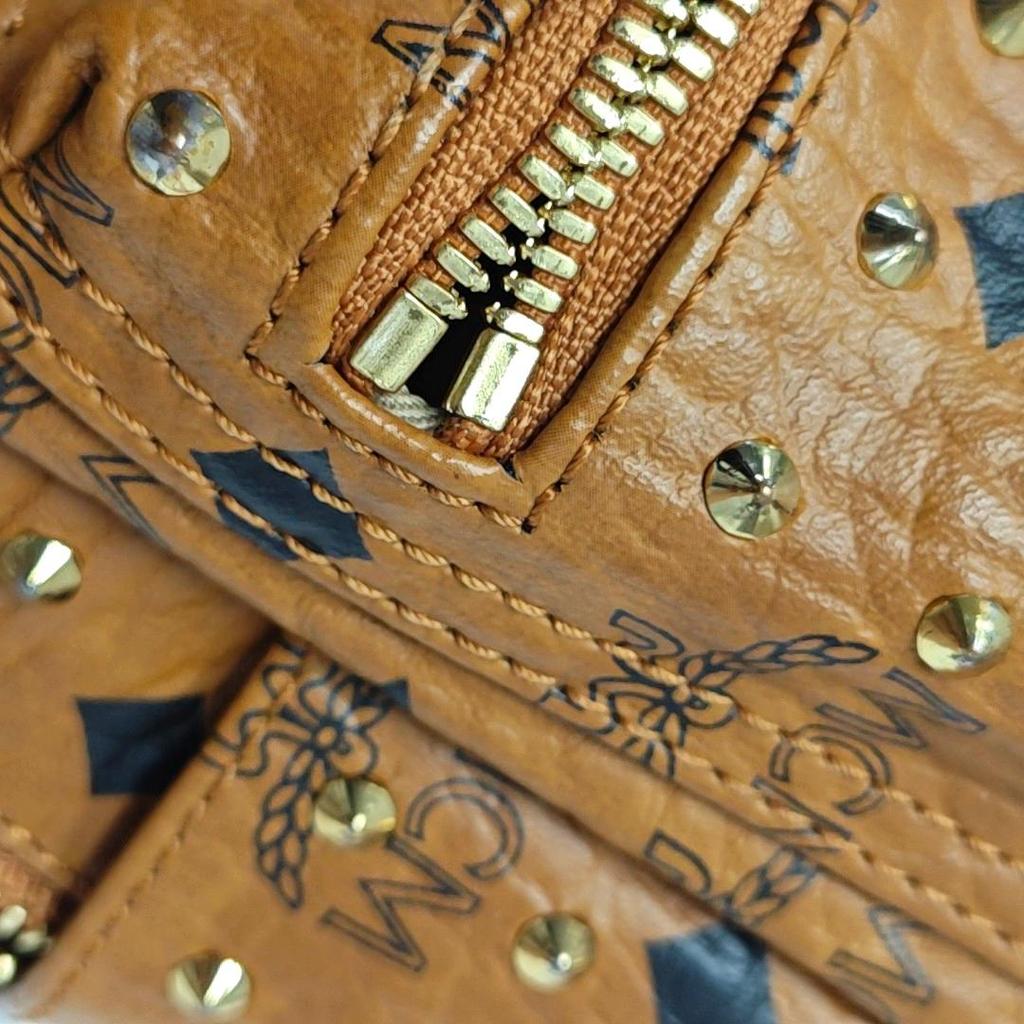 [Pre-Owned] Classic Studded Monogram Print Leather Mini Backpack - Good #A7KIIG