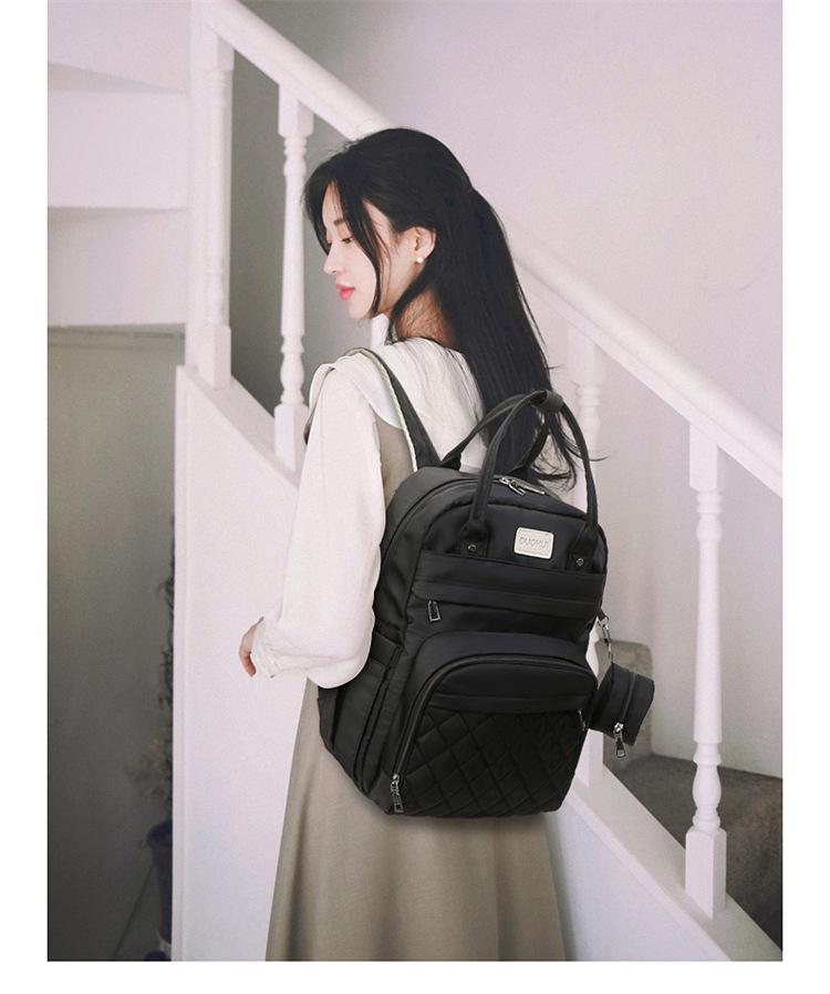 Portable Folding Diaper Bag: Large Capacity Shoulder Bag for Travel, Stroller Hanging, with Baby Bottle Holder and Changing Pad