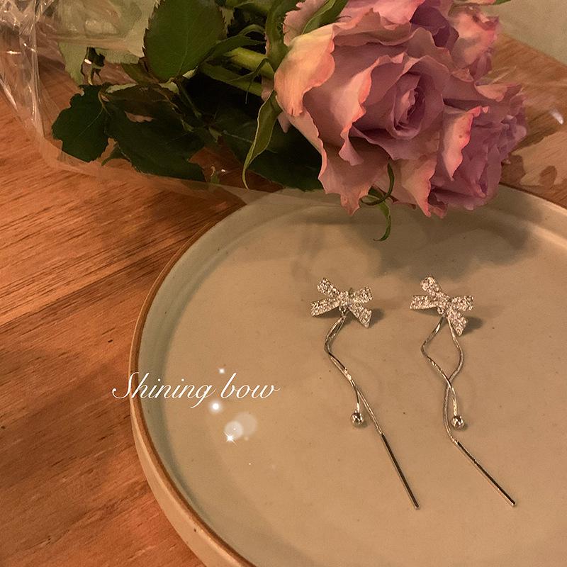 

2024 Fashion French Bow Tassel Earrings - Elegant High-End Ear Clips for Women