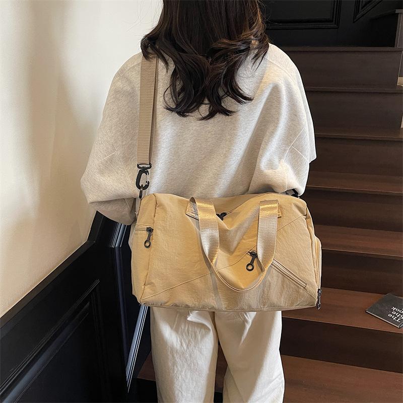 Travel bag women's new large-capacity travel bag niche design casual fitness bag personalized trendy shoulder yoga bag