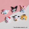Sanrio Cartoon DIY Accessories Set: Mahjong Phone Case, Crocs Charms, Water Cup, Cream Glue, Stickers, Hair Clips, and Hair Ties.