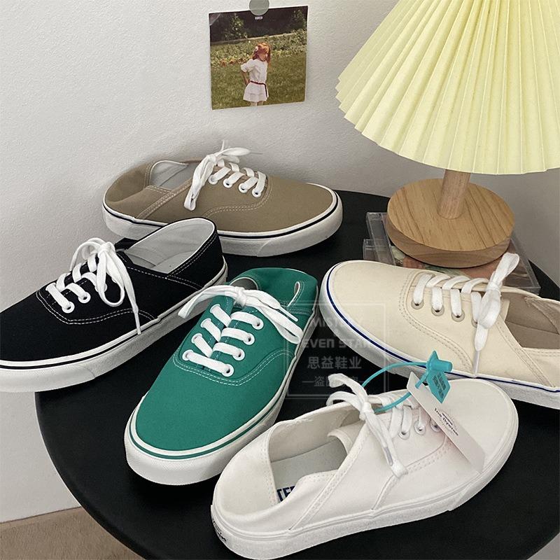 You can step on the heel and half-drag canvas shoes. Women wear white shoes. Women are versatile and pedal lazy shoes 518.