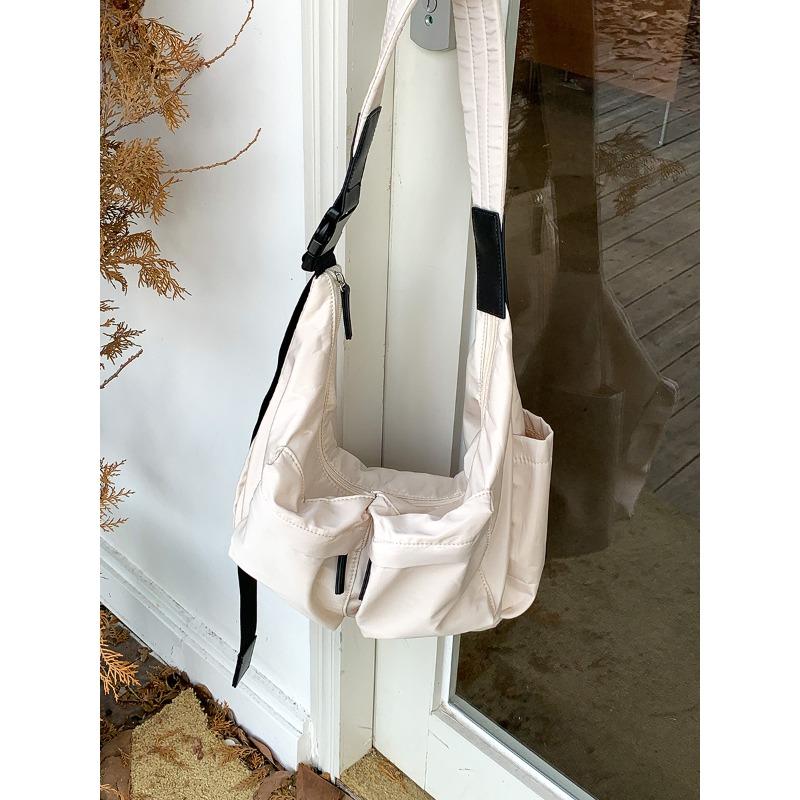 

Casual nylon dumpling bag large capacity fashion messenger bag women niche high sense versatile shoulder bag women брудно-білий