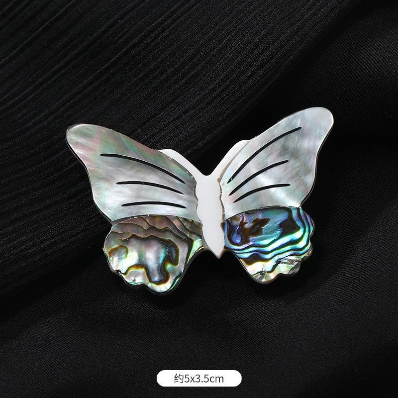 

Design sense natural shell butterfly brooch niche temperament high-end white fritillary corsage suit high-end accessories women