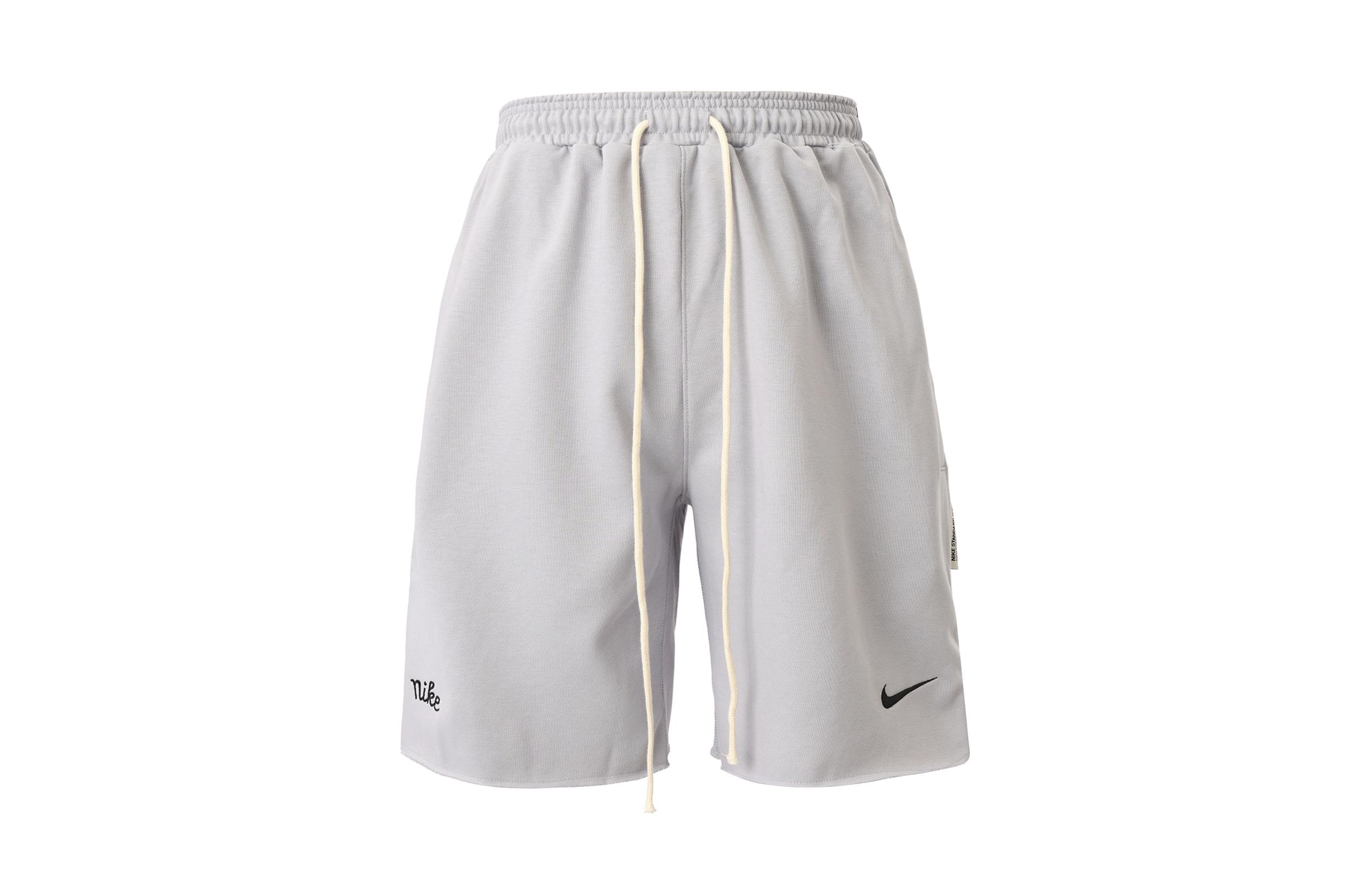 

Баскетбольные шорты Nike Dri FIT Sport Standard Issue Мужские Серый волк/Черный FN2891-012 XL
