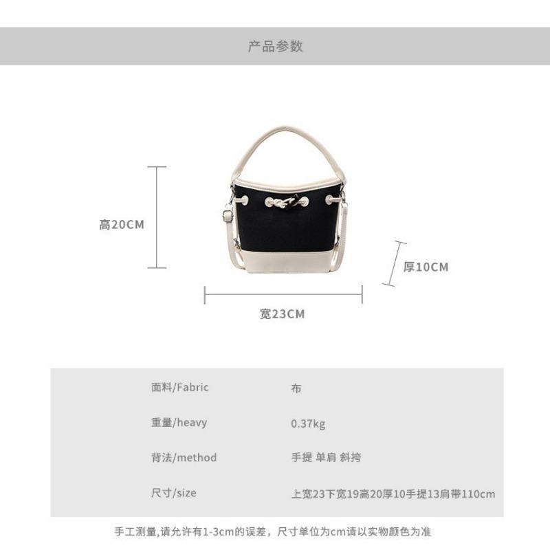 Niche design canvas splicing contrasting color bucket bag women's new portable commuter bag shoulder messenger bag