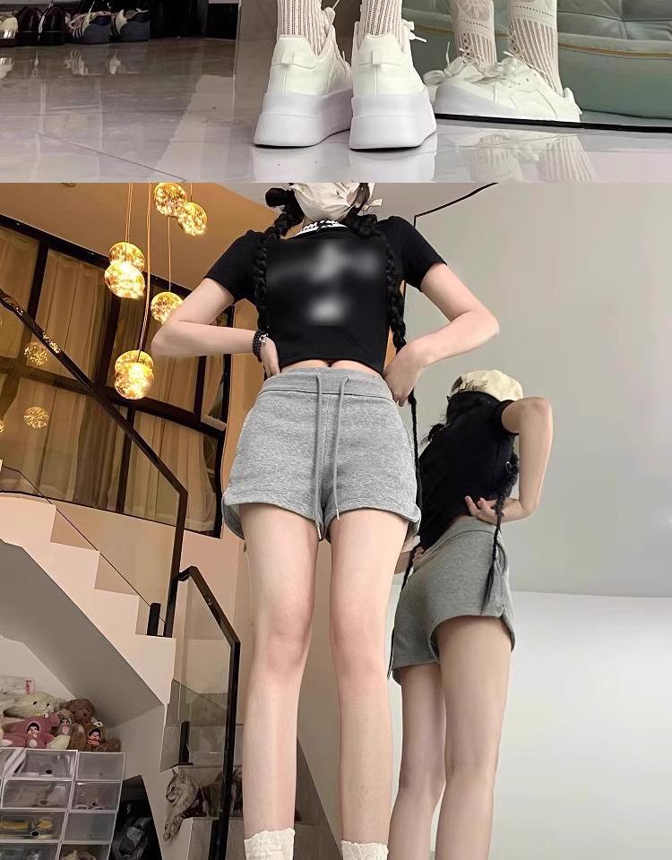 Women's Spicy Girl Black Drawstring Casual Shorts: Autumn Elastic Waist, Slit Straight Leg, Solid Color Fashion.