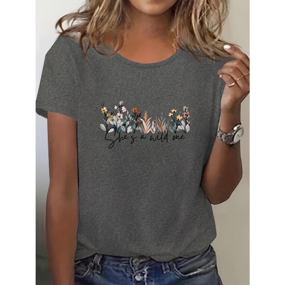 Women's Casual Short Sleeved Round Neck T-shirt with Vibrant Blue Floral Print Featuring "She's Wild At Heart" Reference To Women's T-shirt