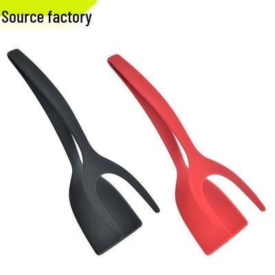Multifunktionaler Nylon Zwei-in-Eins Pfannenwender und Klemme für Steak, Spiegeleier und Fisch.