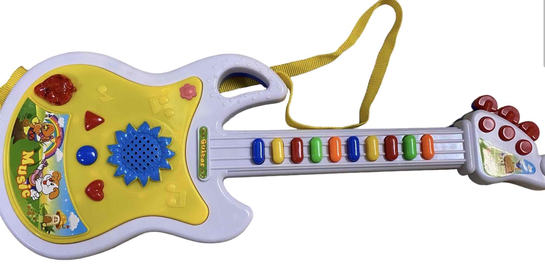 

Kids guitar button type toy guitar white