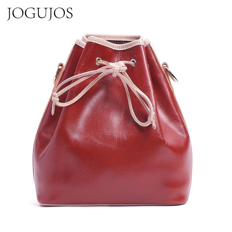 

Cowhide single shoulder crossbody drawstring portable bucket bag women s genuine leather bag retro fashion simple women s bag