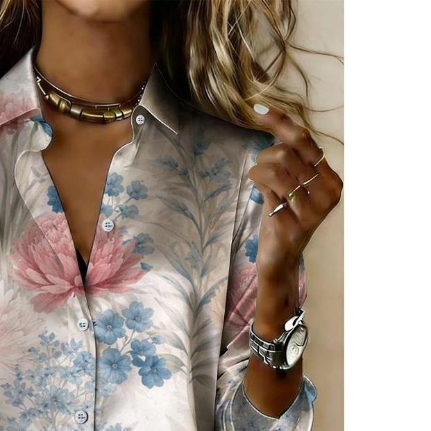 The lady's long-sleeved button-down shirt features a printed and delicate floral design, making it perfect for both romantic and casual styles.
