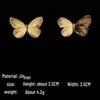 Exquisite Butterfly Hollow Stud Earrings: European & American High-End Fashion