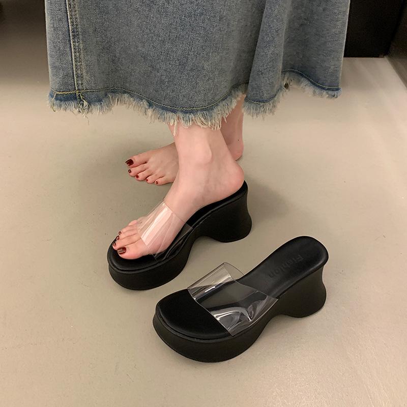 In the summer of 2025, the new thick-soled one-word transparent belt slippers with wedge heels and high-heeled sandals wear muffin women's shoes